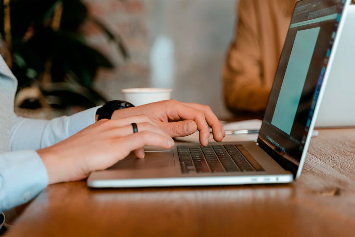 A Person Using a Laptop